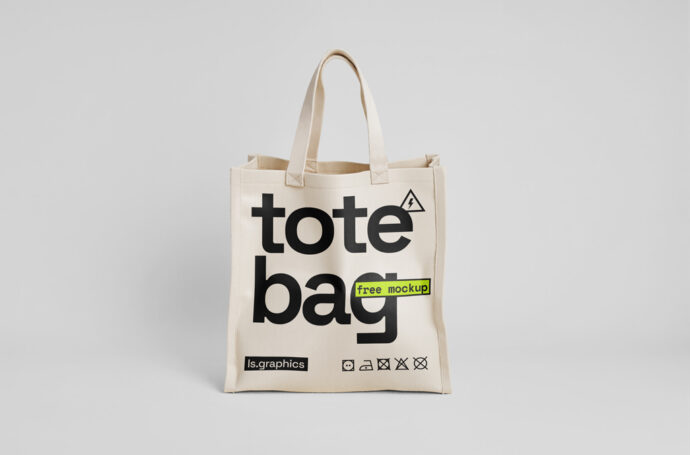 Sacola bege de tecido com tipografia grande em preto, destacando as palavras 'tote bag'.
